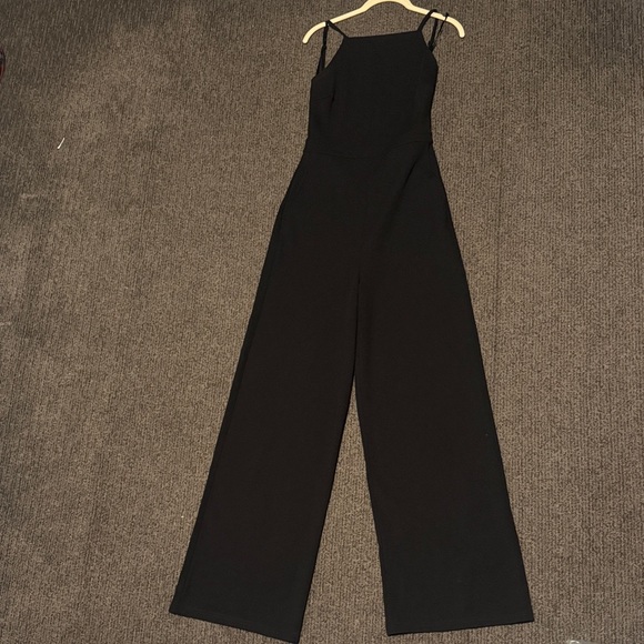 Lulus Pants - Lulu's Classic & backless Black Jumpsuit